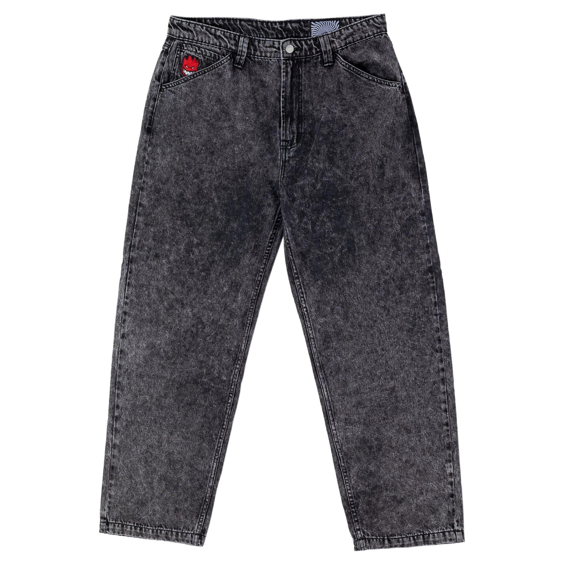Black acid-wash jeans with a red tag on a white background