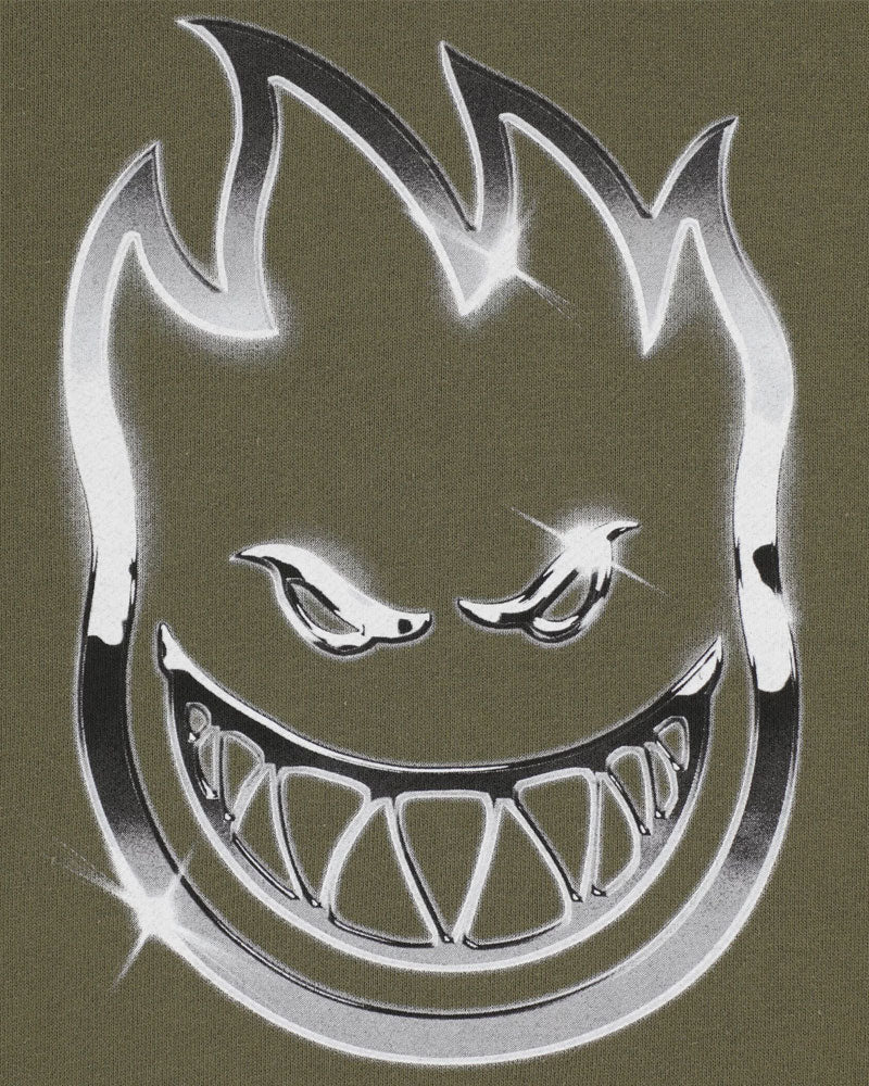 Metallic logo with a stylized face on a brown background