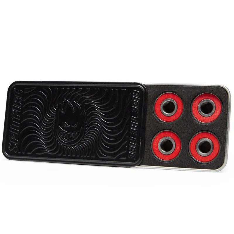 Black and red skateboard truck assembly with a logo on a white background