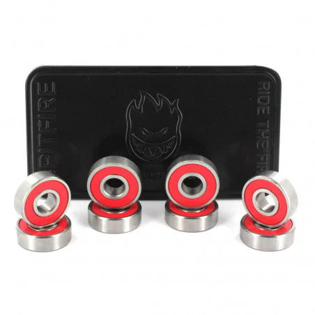 Set of red and silver bearings with a black Pitfire branded card in the background