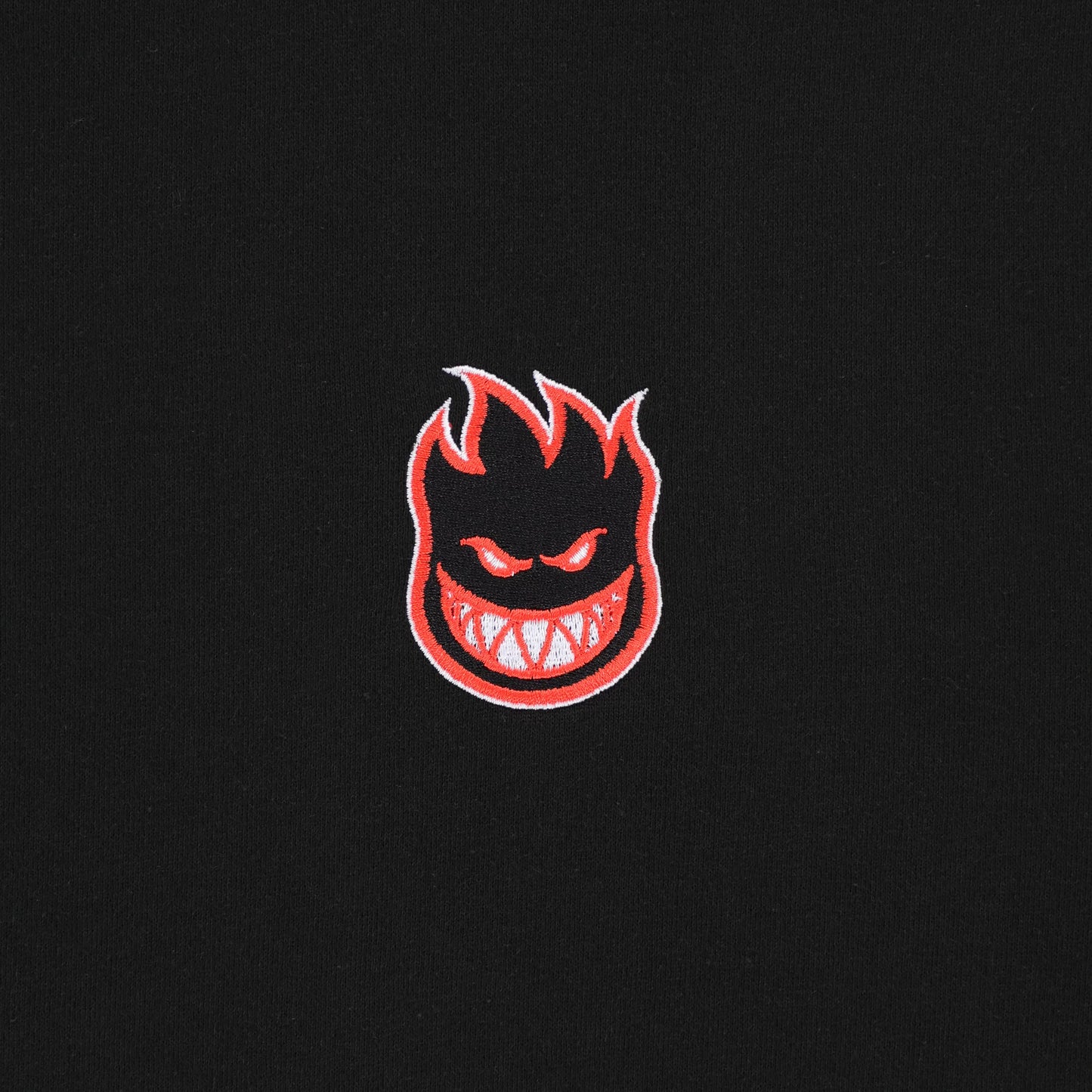 Embroidered logo on a black background