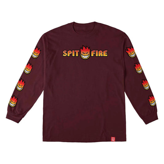 A long-sleeve crewneck t-shirt in maroon, featuring the 'Spit Fire' logo printed across the chest in yellow and orange, with matching flame-head graphics running down both sleeves.