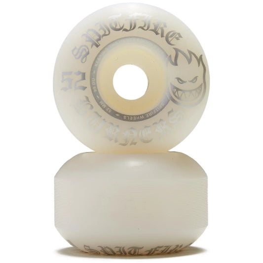 Two translucent off-white skateboard wheels stacked vertically on a white background, featuring gray 'spitfire' branding and the character face graphic.