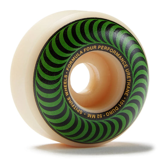A single skateboard wheel with a cream-colored urethane outer body and a black and green striped inner ring, featuring gold text that reads 'FORMULA FOUR PERFORMANCE URETHANE 101 DURO 52 MM spitfire WHEELS'.