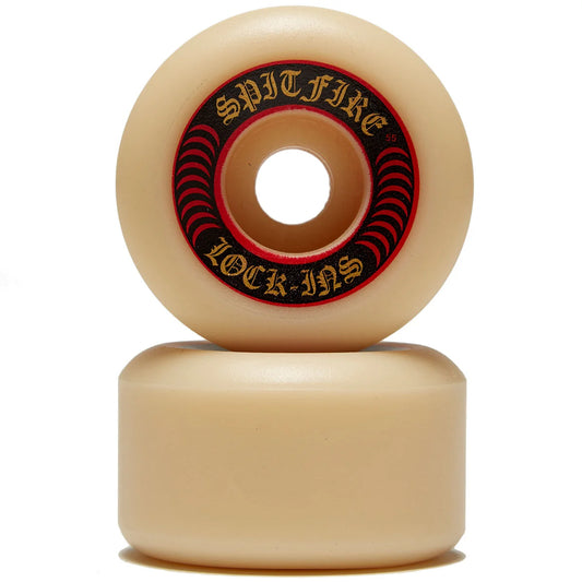 Beige skateboard wheel with 'Spitfire' branding on a white background