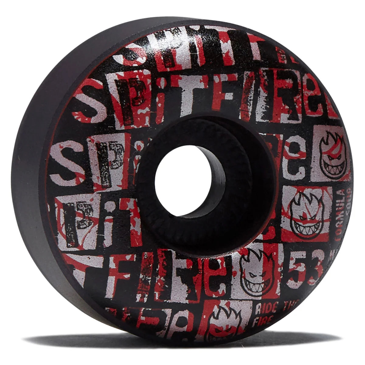 Skateboard wheel with red and white graphics on a black background