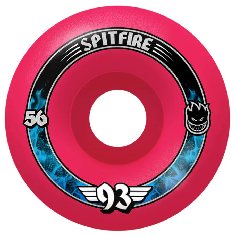 Pink Spitfire skateboard wheel with black and blue accents on a white background