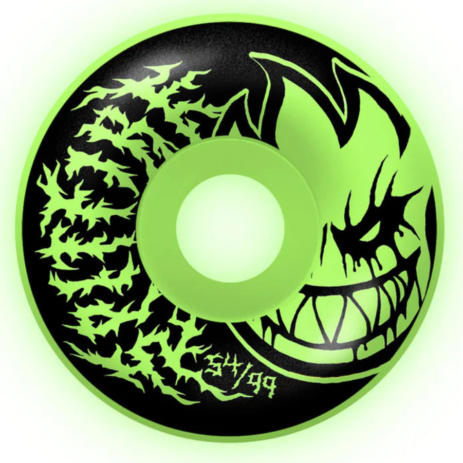 Glowing green and black wheel with intricate design on a white background