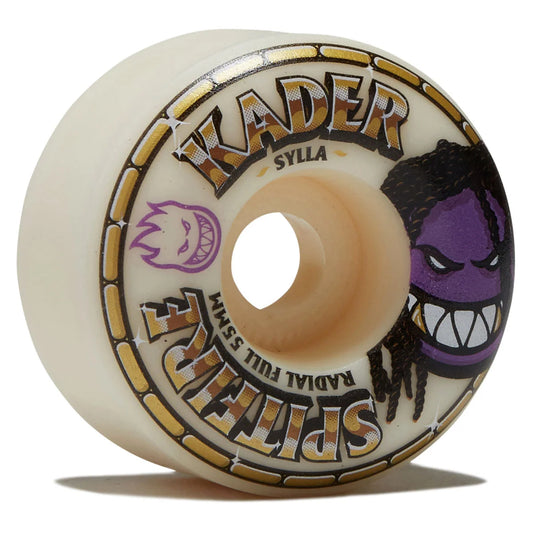 A single Kader Sylla Spitfire skateboard wheel on a clean white background. The wheel is cream-colored with gold and black graphics, featuring the Kader logo, the word 'SPITFIRE', a purple angry face graphic, and the text 'RADIAL FULL SWAM'.