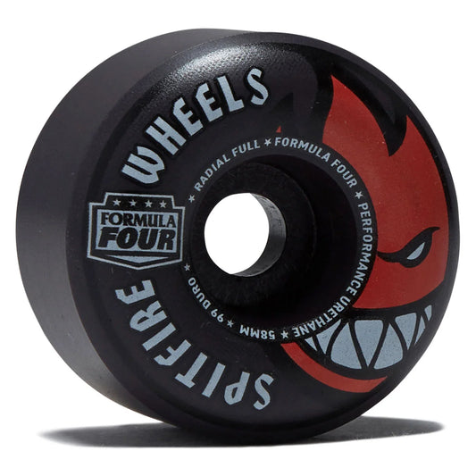 A single black skateboard wheel with white text reading 'WHEELS' and 'SPITFIRE', a 'FORMULA FOUR' logo, and a red graphic on the side, photographed on a white background.