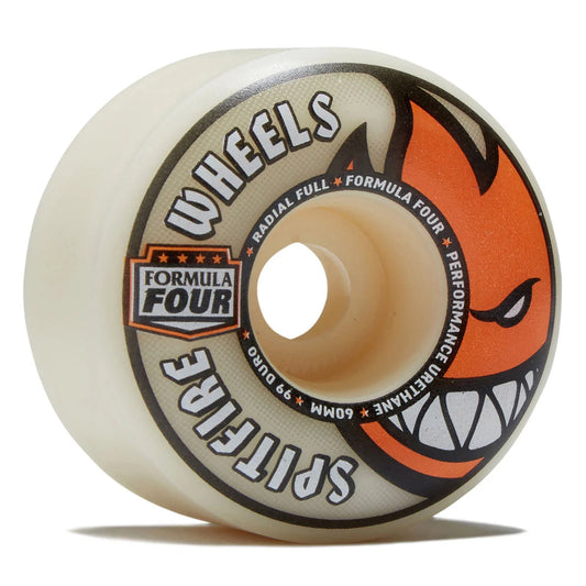 A single Spitfire Formula Four skateboard wheel with a translucent cream-colored urethane body, featuring a black and orange graphic of a snarling fox face and white text.