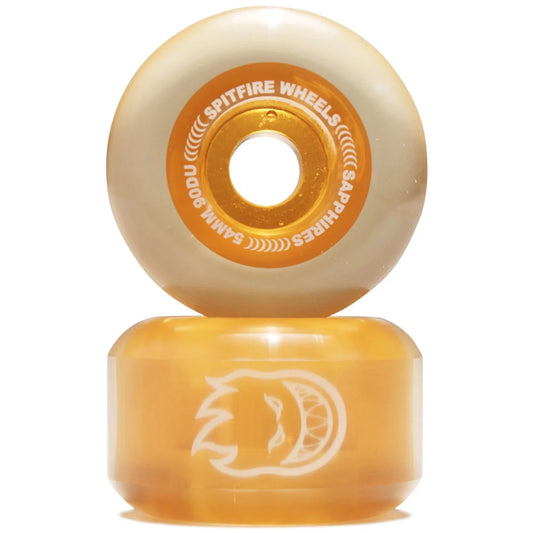 Two yellow skateboard wheels with orange centers on a white background
