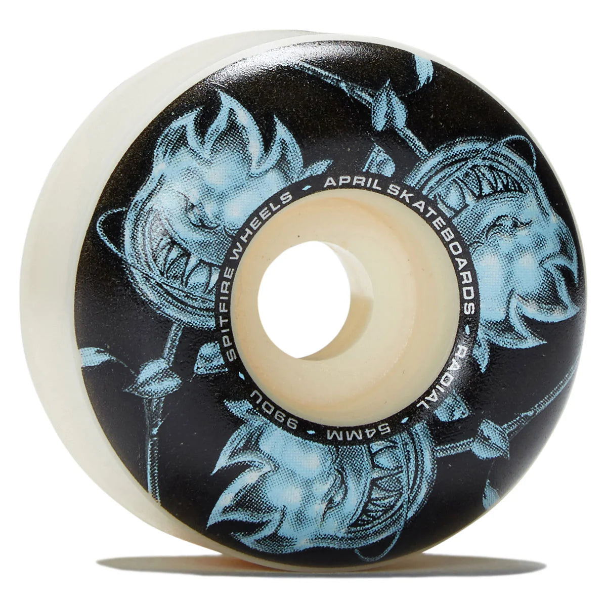 A single skateboard wheel with a black outer barrel featuring a light blue illustrated graphic of a snarling face, a cream-colored urethane edge, and printed text reading 'SPITFIRE WHEELS - APRIL SKATEBOARDS - RADIAL - 54MM - 98dU'.
