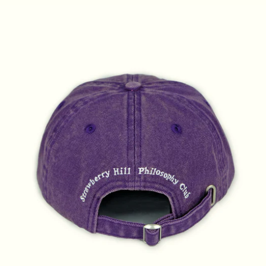 Purple cap with 'Strawberry Hill Philosophy Club' text on a white background