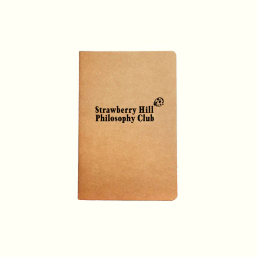 Kraft paper notebook with 'Strawberry Hill Philosophy Club' text on a white background