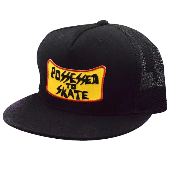 Black trucker cap with a yellow patch that says 'Posseded to Skate' on a white background