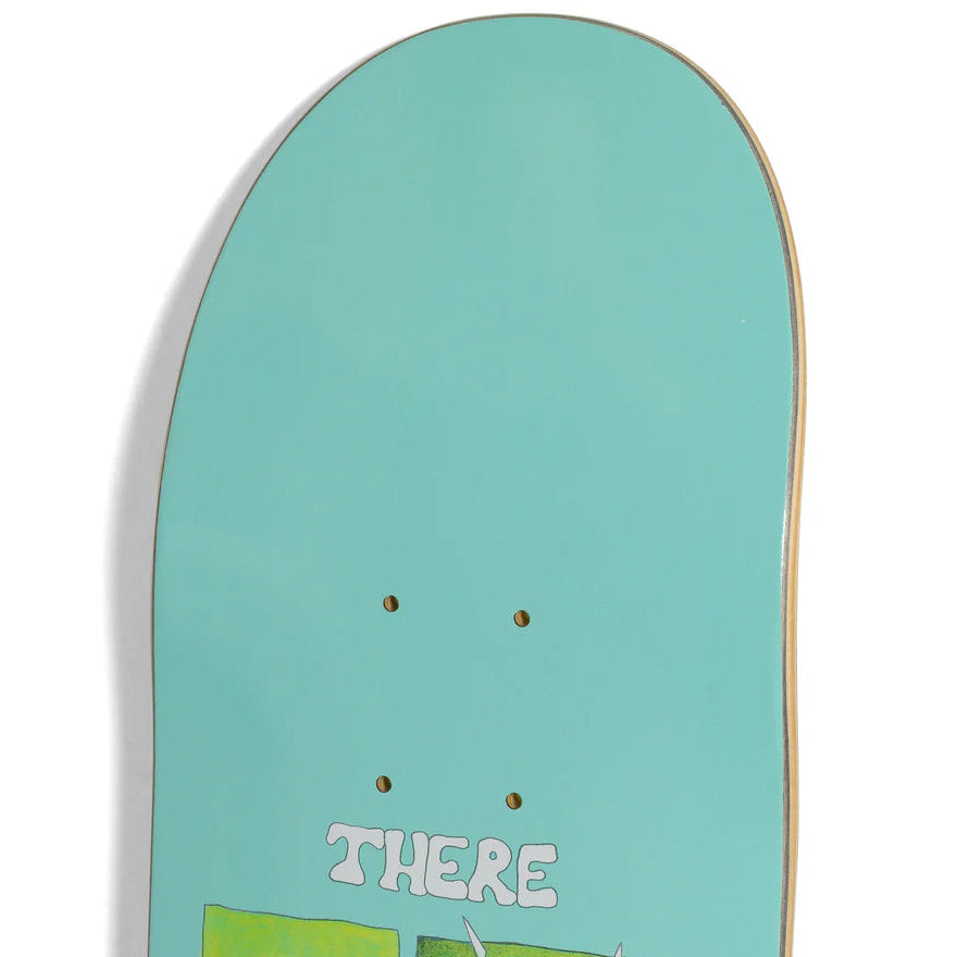 Skateboard deck with 'THERE' text on a light blue background