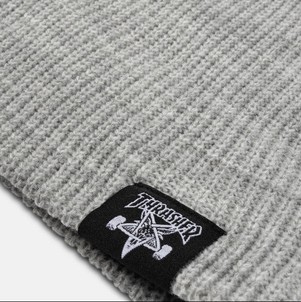 Gray knit beanie with a brand label on a light gray background