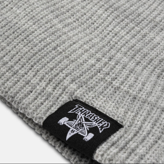 Gray knit beanie with a brand label on a light gray background