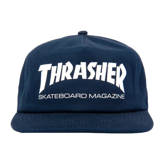 Navy blue cap with white 'Thrasher Skateboard Magazine' logo on a light gray background