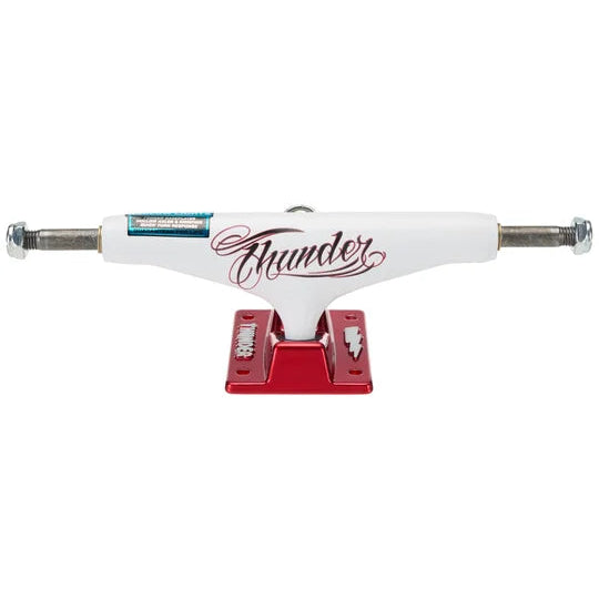 White skateboard truck with red trucks on a white background