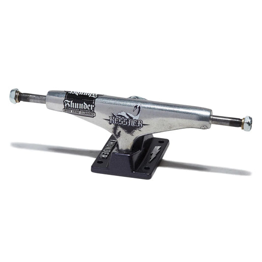 A single skateboard truck with a silver metal hardware body and a black mounting base, photographed on a clean white background with a soft shadow.