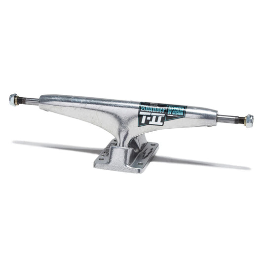 A single silver metal skateboard truck with a visible 'PW' logo sticker, shown on a clean white background with a soft shadow.
