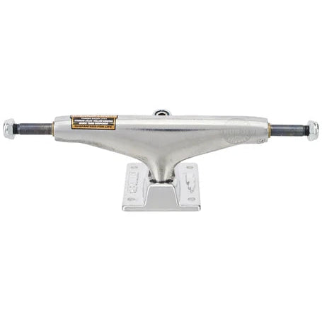 Skateboard truck with silver metal finish on a white background