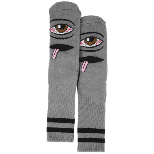 Gray knee-high socks with eye and tongue design on a white background
