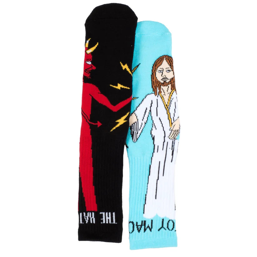 Two socks with illustrations of a devil and a religious figure on a white background