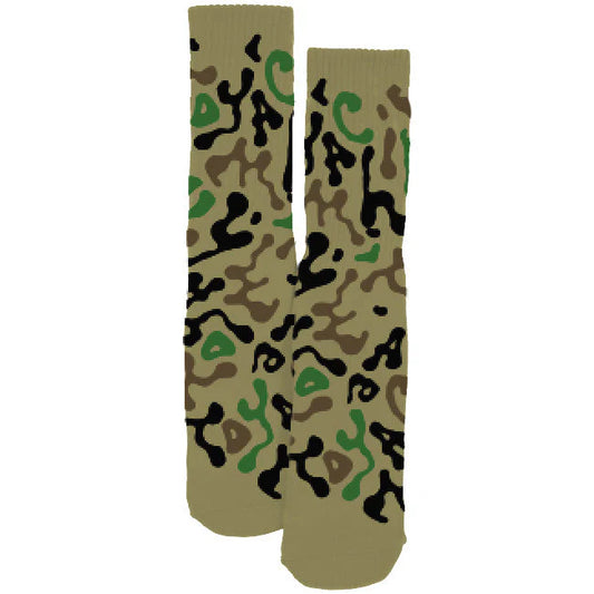 Camouflage-patterned socks on a beige background