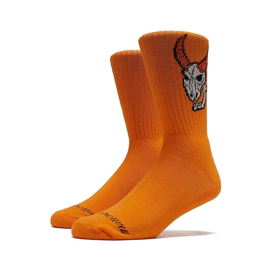 Orange socks with a black and white design on a white background