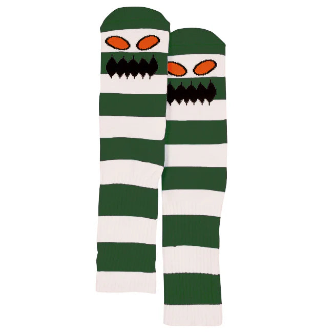 Green and white striped socks with a cartoonish face design on a white background