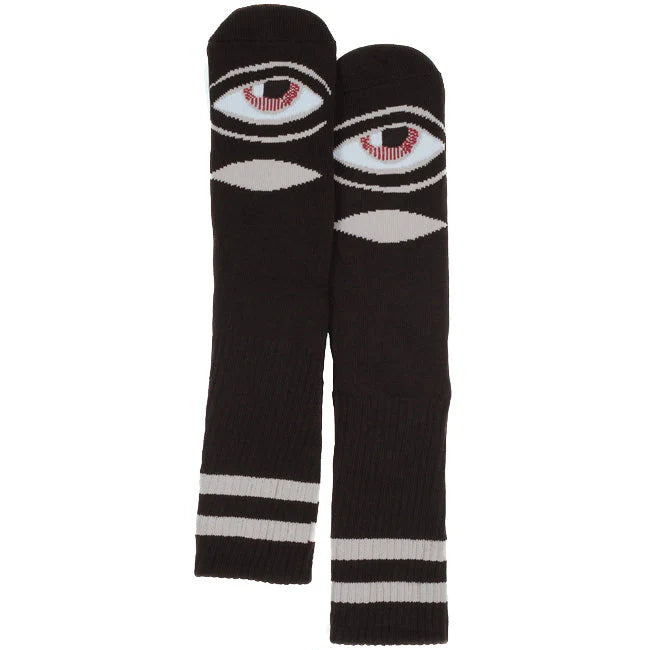 Black socks with eye design on a white background