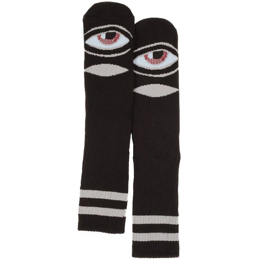 Black socks with eye design on a white background