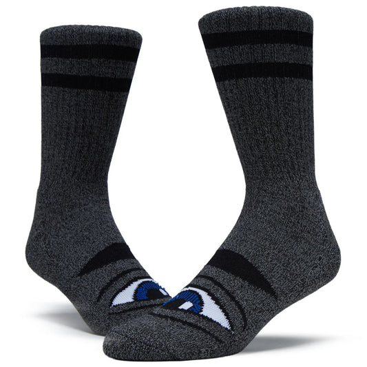 Pair of gray socks with cartoon face design on a white background