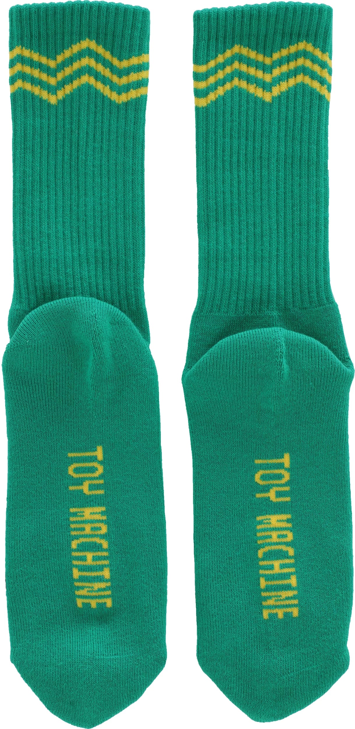 Pair of green socks with yellow stripes and 'Toy Machine' branding on a white background