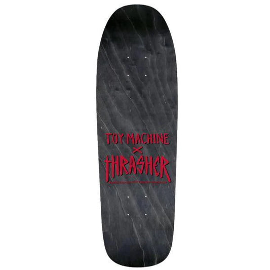 Skateboard deck with Toy Machine and Thrasher logos on a white background