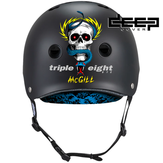 Black helmet with skull design and 'triple eight McGill' branding on a white background
