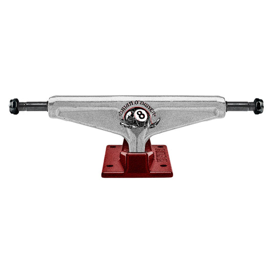 Skateboard truck with red baseplate and silver metal components on a white background