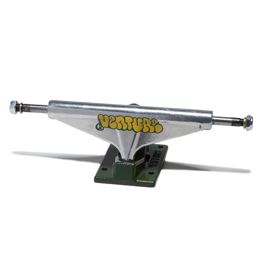 A single skateboard truck with a silver metal chassis and a dark green base plate, featuring the brand name 'venture' in yellow with a green outline on the side. The truck is photographed on a clean white background with a soft shadow cast to the left.