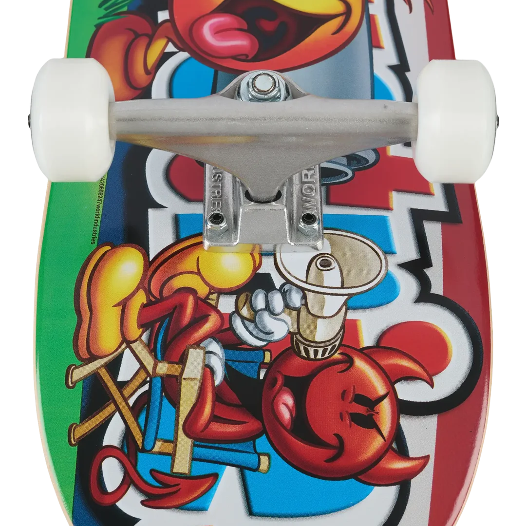 Close-up of a skateboard deck underside showing a colorful cartoon graphic with a red devil character, white wheels, and silver trucks on a white background.