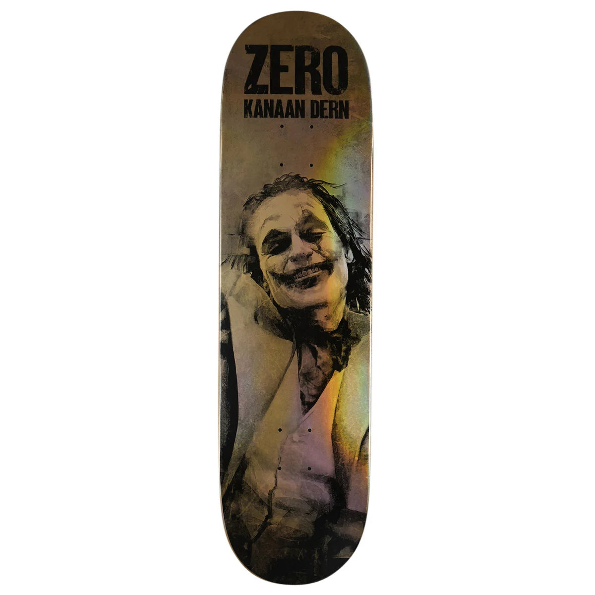 A skateboard deck featuring a stylized portrait of the Joker with the text 'ZERO' and 'KANAAN DERN' printed on the top surface, shown against a plain white background.