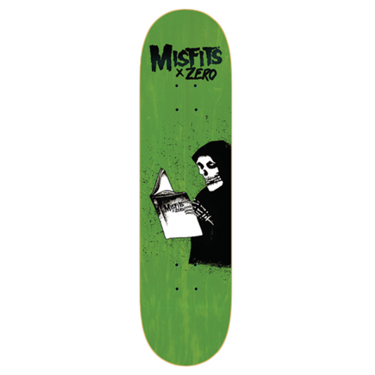 Green skateboard deck with a skeleton holding a book design and 'Misfits x Zero' text on a white background.