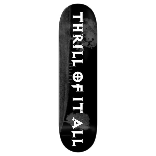 A skateboard deck shown vertically against a plain white background. The deck is black with bold white text reading 'THRILL OF IT ALL' and a smoky gray graphic design.
