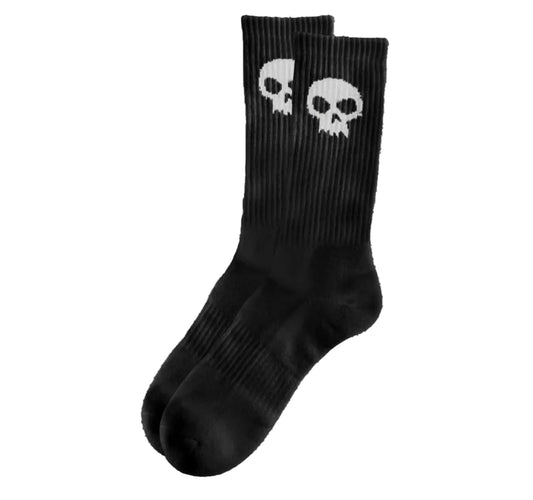 Black socks with white skull designs on a white background