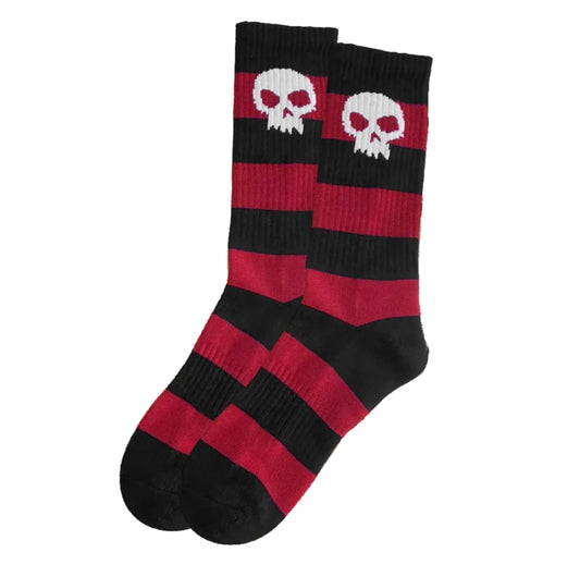 Black and red striped socks with skull designs on a white background