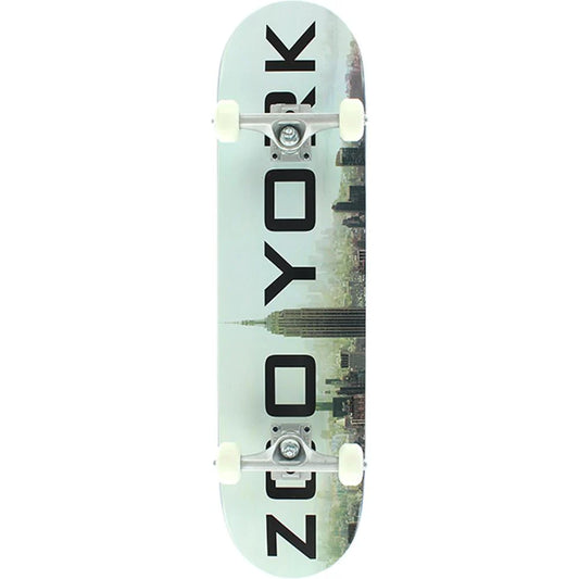 Skateboard with a cityscape design and 'Zoo York' text on a light green background