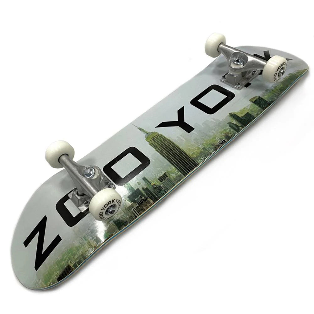 Skateboard with a cityscape design and 'Zoo York' branding on a white background