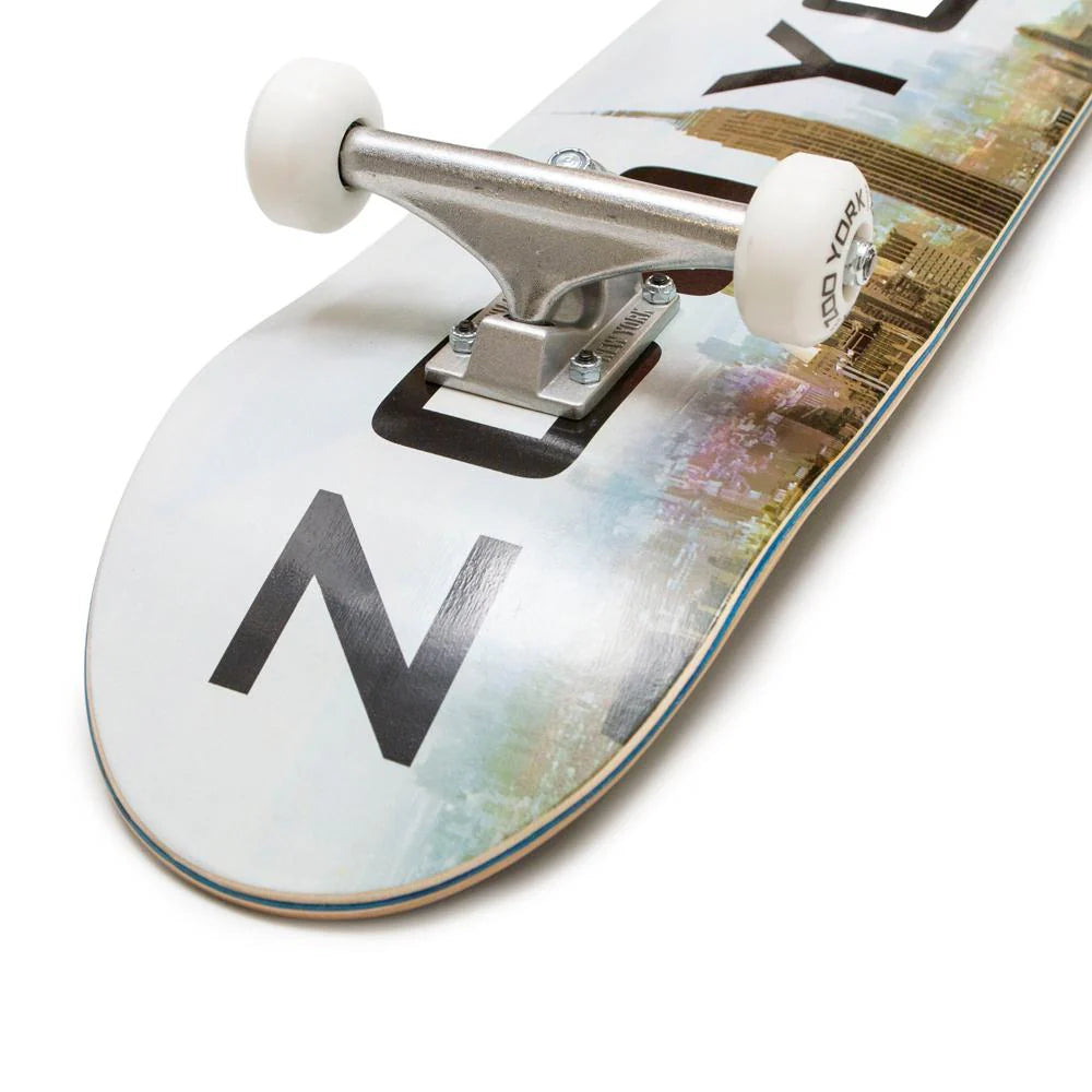 Close-up of a skateboard with a brand logo on a white background